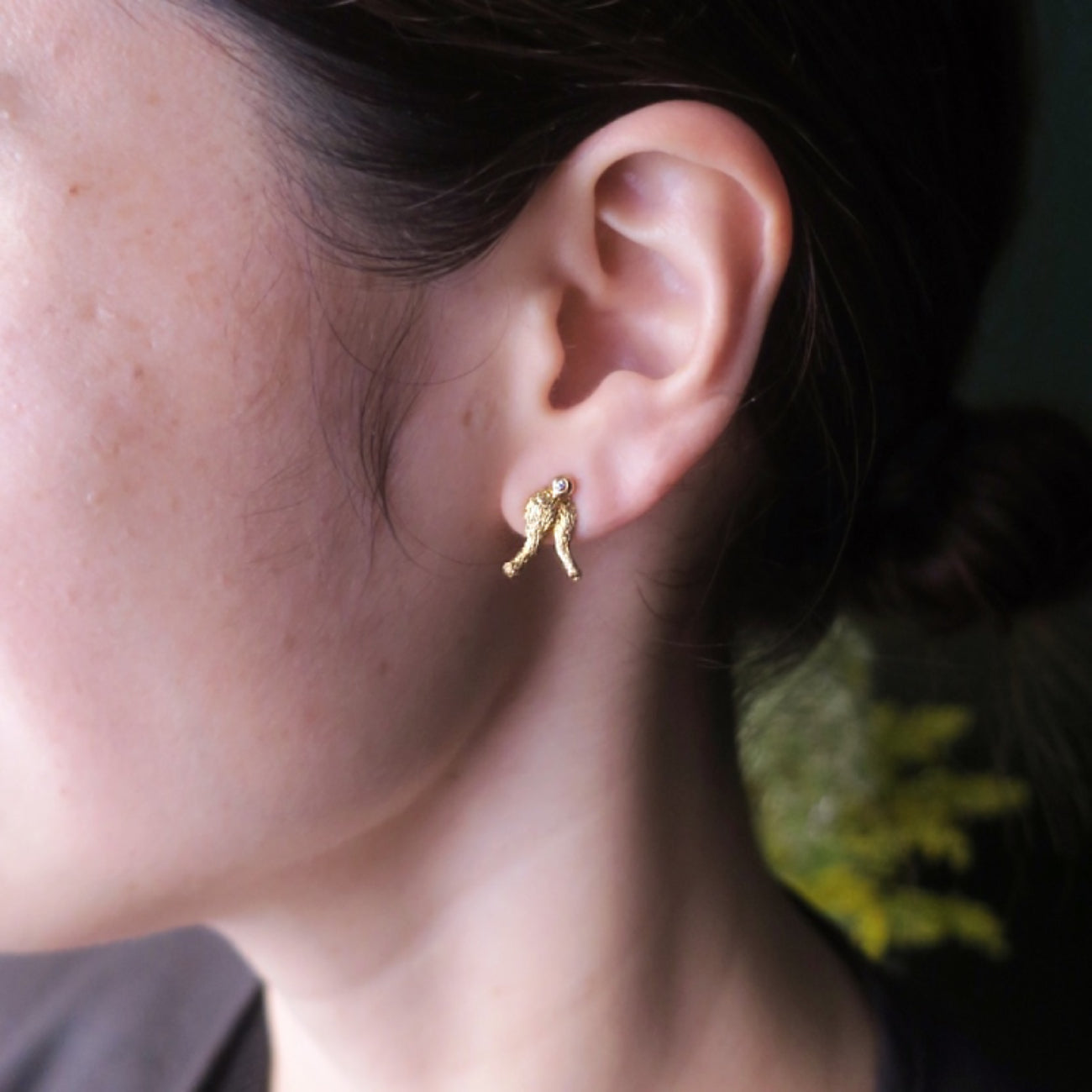 Rabbit rear earring in gold plated sterling silver worn on ear side view