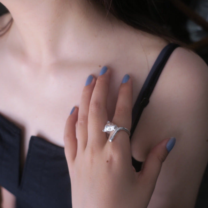 Handcrafted panther ring in sterling silver worn on a woman’s elegant hand — sculptural animal jewelry by Fusako Koike Paris, from the “Eat Yourself” collection.