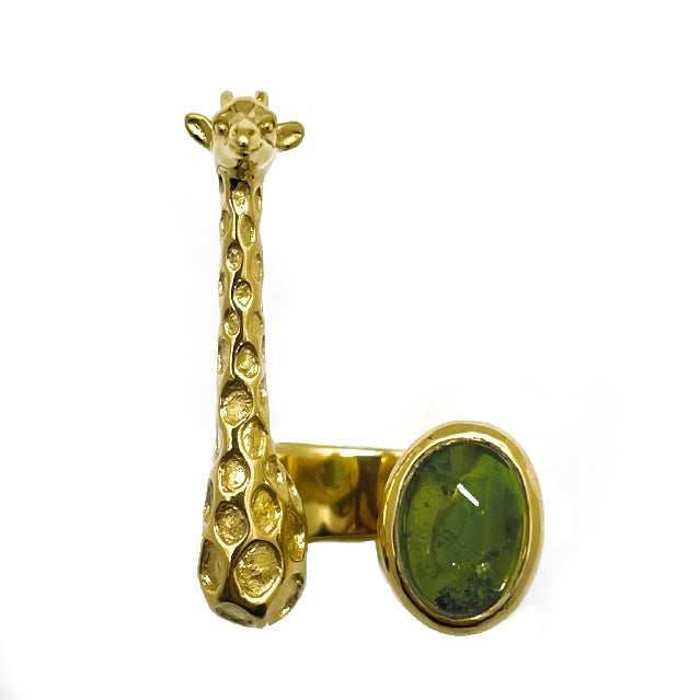 Hand-sculpted gold giraffe ring with an oval green tourmaline cabochon, displayed on a white background.