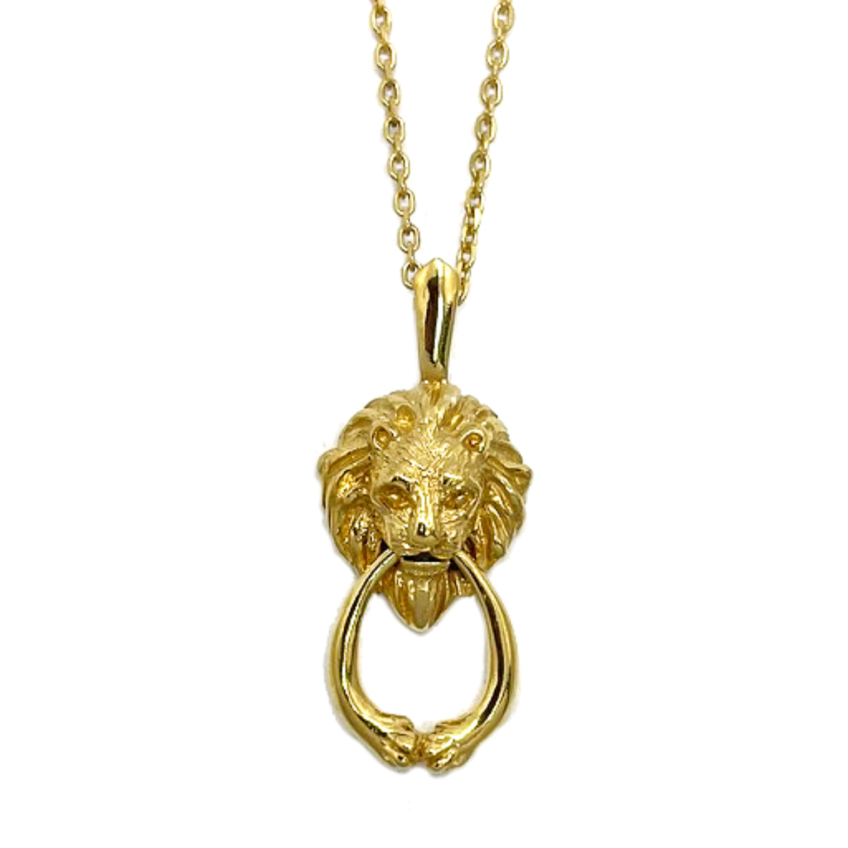 Gold lion door-knocker necklace close-up — hand-sculpted lion head holding a movable drop ring, inspired by European antique hardware.