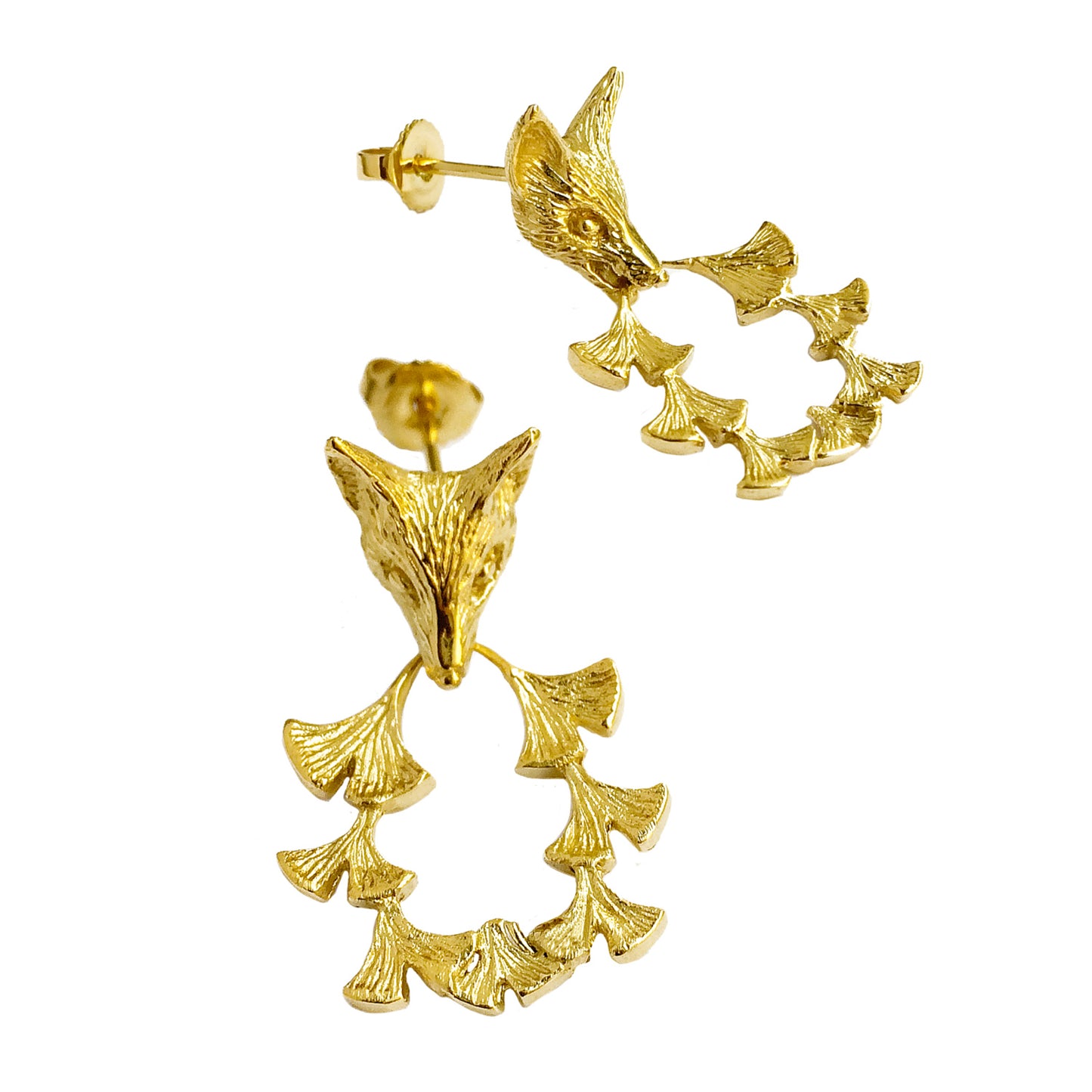 Three-quarter view of gold fox and ginkgo leaf earrings showing textured leaves and sculpted fox head – artisanal gold plated earrings.