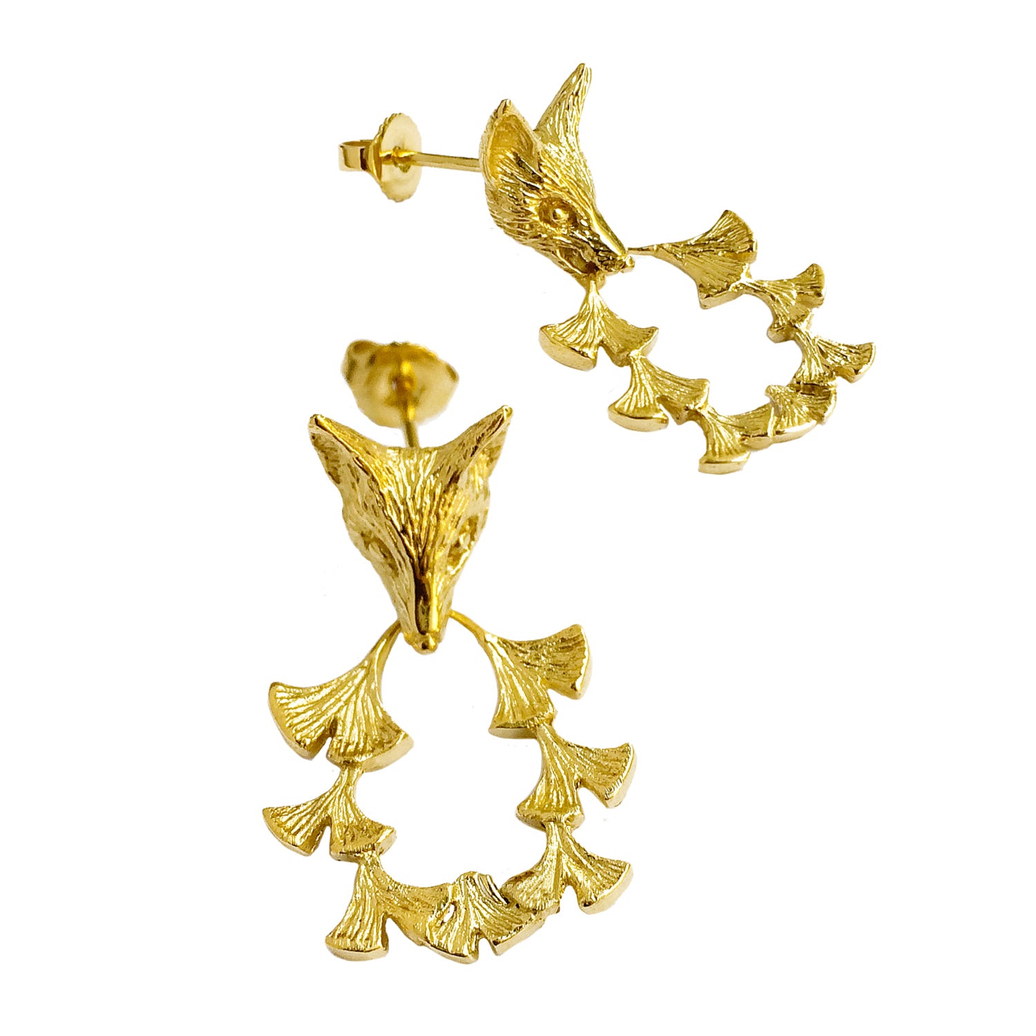 Three-quarter view of gold fox and ginkgo leaf earrings showing textured leaves and sculpted fox head – artisanal gold plated earrings.