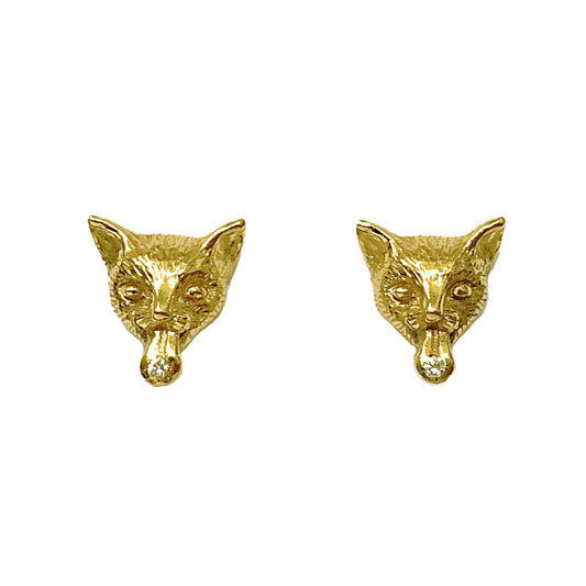Hand-sculpted gold-plated sterling silver cat earrings with playful sticking-out tongues, each accented with a white sapphire. Artisan animal jewelry designed in Paris.