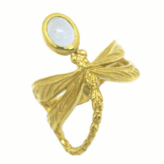 Gold dragonfly ring with milky aquamarine cabochon, inspired by Art Nouveau elegance. Hand-sculpted in Paris, showing detailed wings and organic curves.