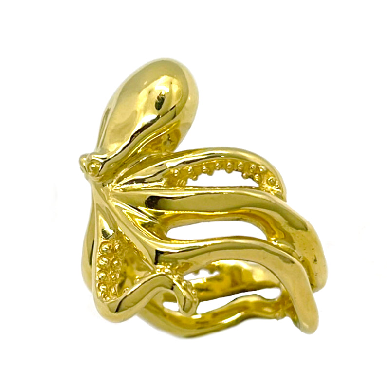 Hand-sculpted octopus ring in polished gold finish, showing textured suction cups and organic curves; sea-inspired statement jewelry for marine life lovers.