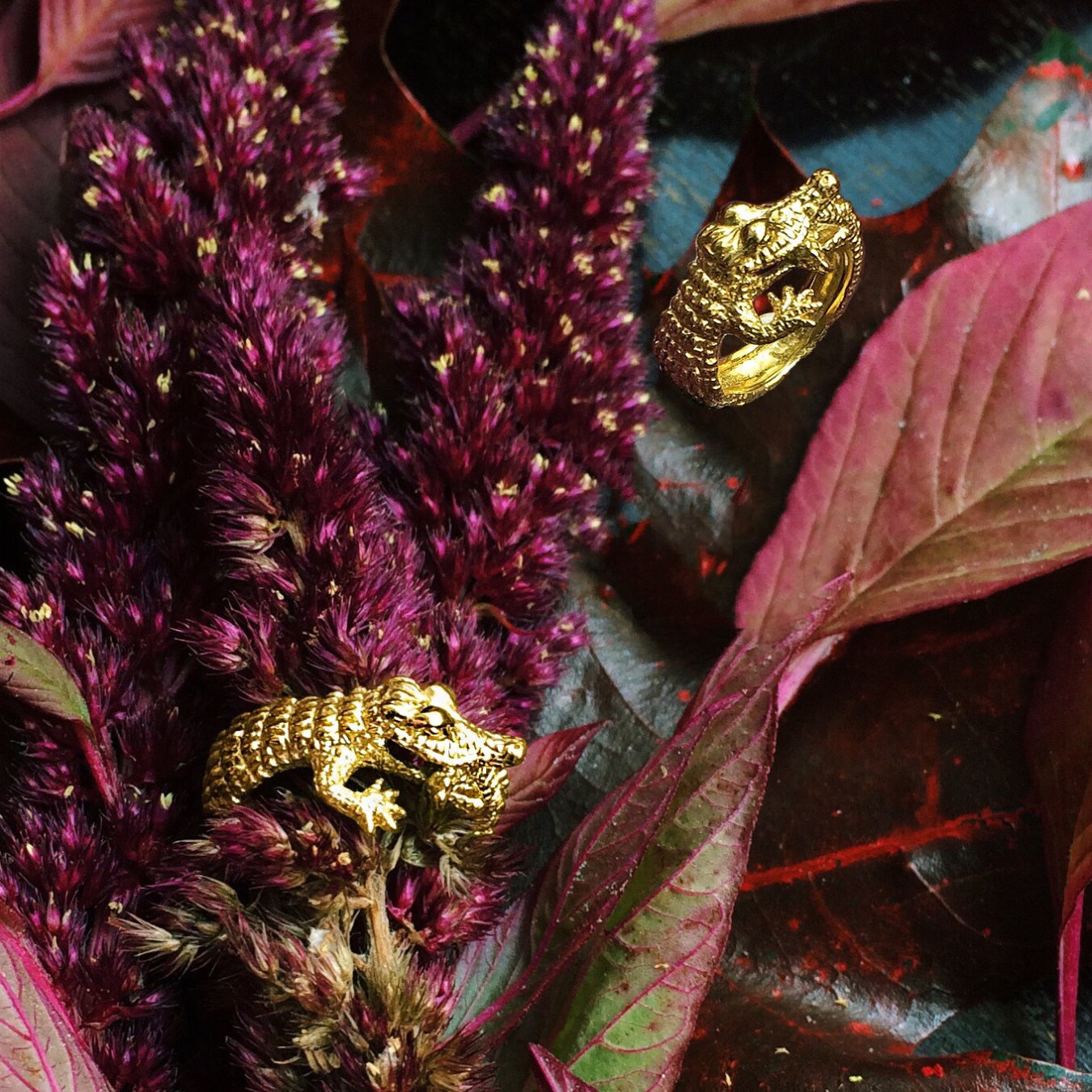 Crocodile ring in 18K gold-plated silver 925 displayed among red autumn leaves, animal jewelry styling