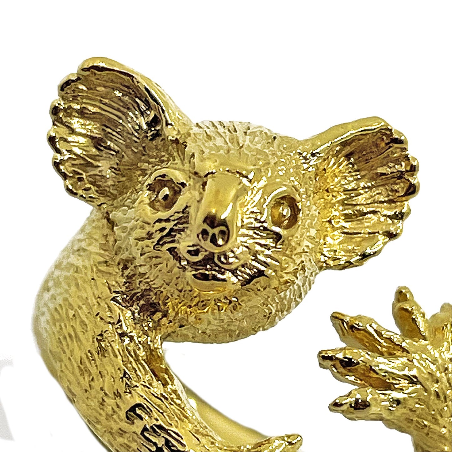Gold-plated koala ring, hand-carved — detailed view of the face, fluffy ears, 
and sculpted claws in 18K gold-plated silver 925