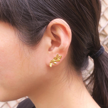 Laurel leaves earrings in gold plated silver held in hand video