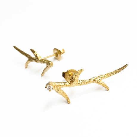 " twigs " piercings with 1 w. sapphire/ gold