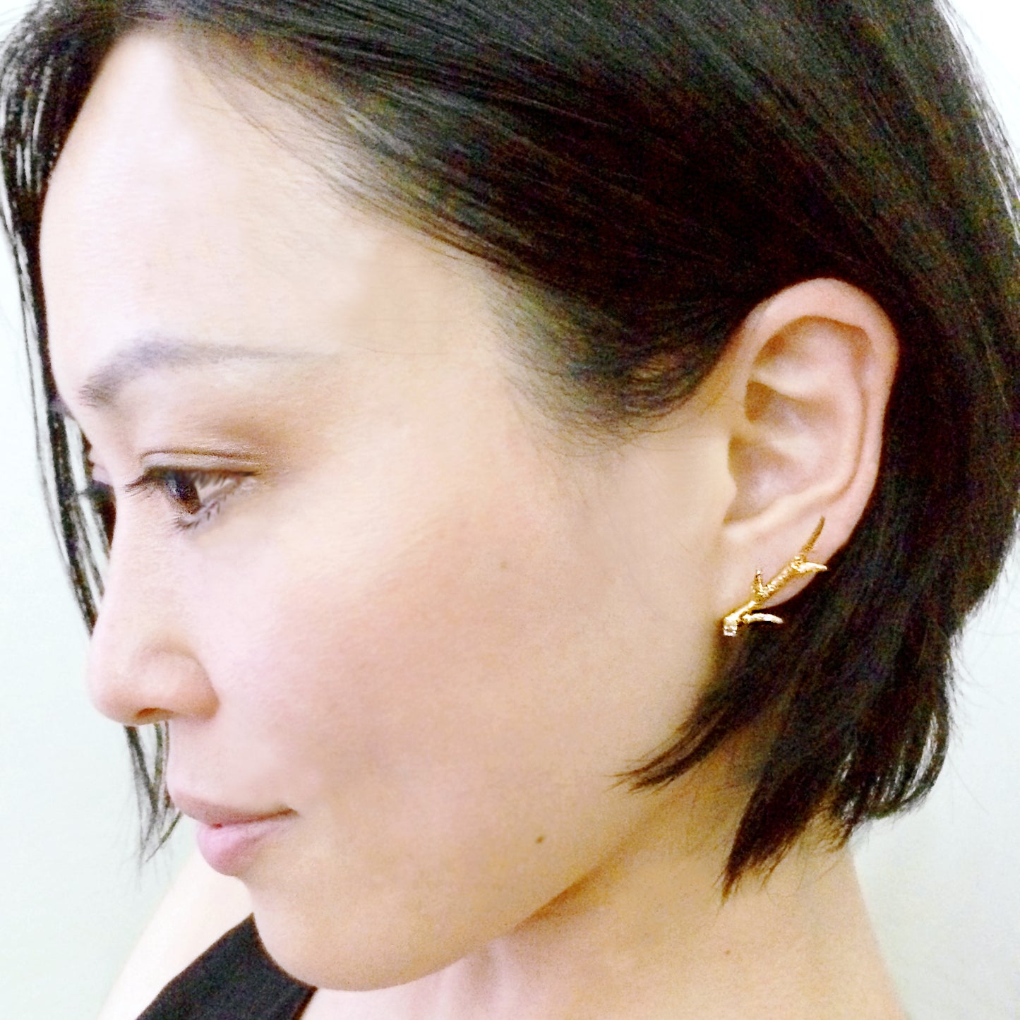 " twigs " piercings with 1 w. sapphire/ gold