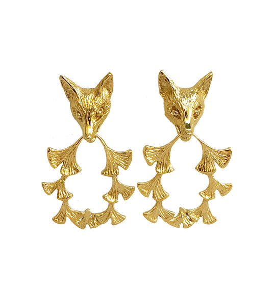 Gold plated fox and ginkgo leaf earrings on white background – handmade animal motif jewellery by Fusako Koike Paris
